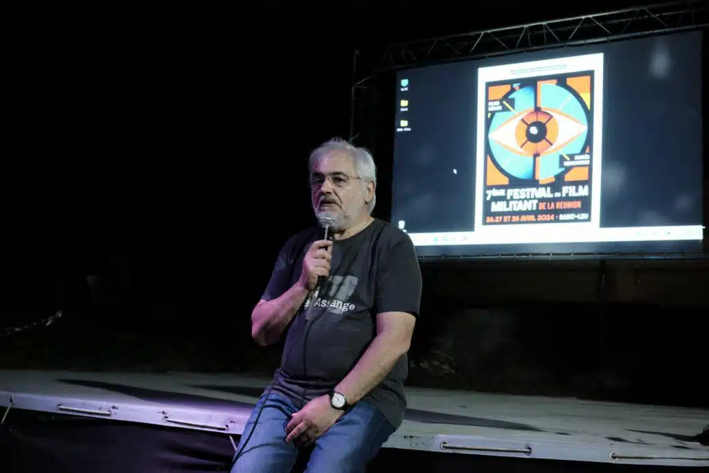 Viktor Dedaj conférencier festival films citoyens Yourtes Julian Assange